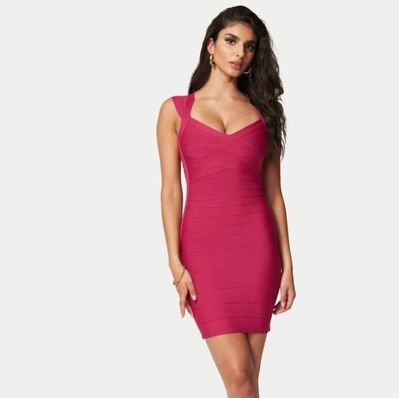 BEBE Luxe Bandage Crisscross dress. Berry Color. Size small - Picture 1 of 14